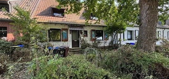 Sanierungsbedürftiges Einfamilienhaus mit Garten in guter Lage Hardt