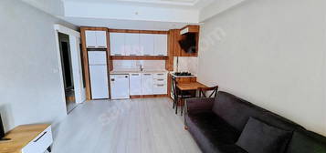 SAĞLAM EMLAKTAN SELÇUKLUDA SATILIK 1+1EŞYALI DAİRE