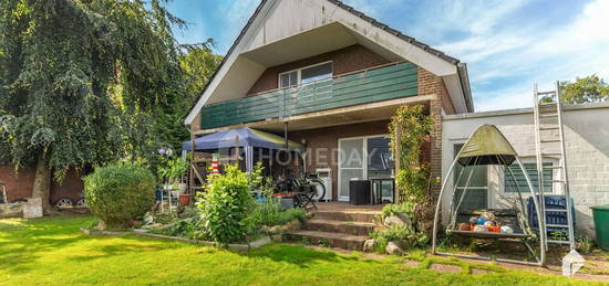 Gepflegte und solide DHH mit Terrasse, Loggia, 2 Bädern, EBK und Carport | Schöne Lage | EEK B!