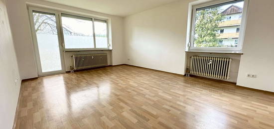 Attraktive 2-Zimmer-EG-Wohnung mit eigenem Garten, Terrasse & großem Südwestbalkon, ca. 77,8 qm