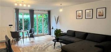 Attraktive Wohnung mit Terrasse, kleinem Garten und separatem Tiefgaragen-Stellplatz zu verkaufen