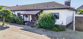 Gemütlicher Bungalow mit idyllischem Garten in zentraler Lage von Rommelhausen