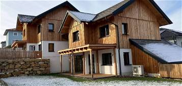 Ökologisches Holzhaus im Chalet-Stil zu verkaufen