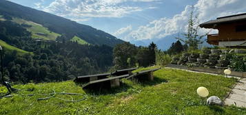 Einzigartige Gelegenheit: Panorama-Gartenwohnung mit Bergblick