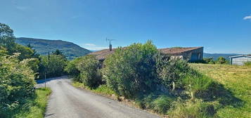 Maison en pierre avec terrain constructible