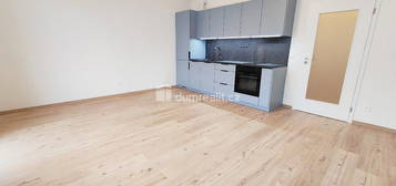 Nový byt 1+kk s garáží, 32,1 m2 + 3,4 m2 balkon, 2. patro, OV, novostavba, Praha 9 - Kbely