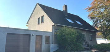 PURNHAGEN-IMMOBILIEN -  1-2-Fam.-Haus mit Wintergarten und Garage in zentraler Lage von Neuenkirchen