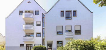 Sofort frei! Sonnige und zentrale Maisonette-Wohnung mit Balkon und TG-Stellplatz