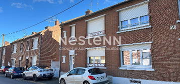 Maison semi-individuelle de 100m² à rafraîchir, à FECHAIN - 3 chambres - Terrasse, jardin, garage - Véranda, cave, dépendances - 160.000 euros