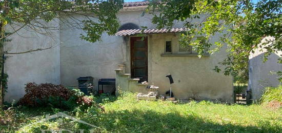 Maison de ville avec garage et jardin