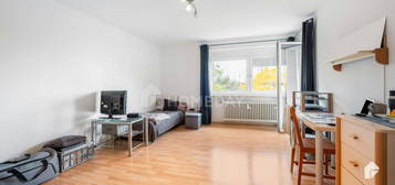 Attraktive 4-Zimmer-Wohnung mit Süd-Loggia, Blick ins Grüne und Tiefgaragenstellplatz