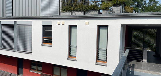 Einzigartige Maisonette-Wohnung mit sonniger Dachterrasse