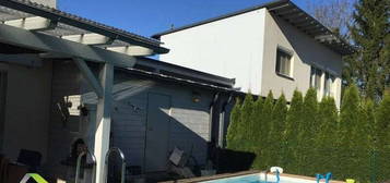 Haus mit Pool, Doppelcarport und Erdwärmeheizung