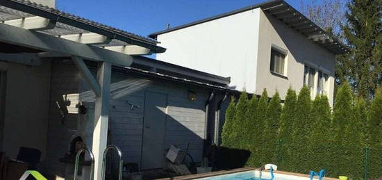 Haus mit Pool, Doppelcarport und Erdwärmeheizung