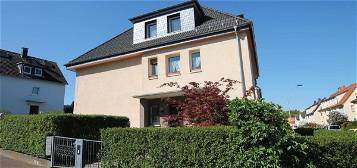 Attraktives Dreifamilienhaus in Beliebter Lage von Bad Vilbel: Ideale Kapitalanlage oder Eigenheim