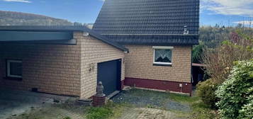 Gemütliches Einfamilienhaus mit traumhaften Weitblick, Garage, Carport uvm!