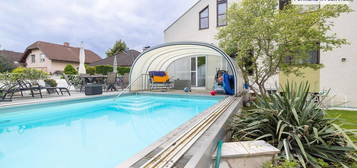 EINFAMILIENHAUS DER EXTRAKLASSE++SWIMMINGPOOL++TONSTUDIO++WINTERGARTEN++GARAGE