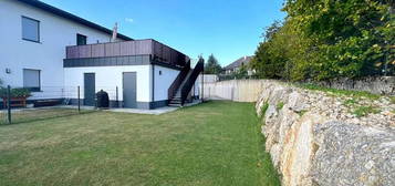 Neubauwohnung mit Garten, Terrasse und Garage in traumhafter Lage