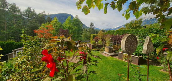 Obsteig: Idyllisches Reihenhaus in sonniger Traumlage mit Garten und gemeinschaftlichem Badeteich!