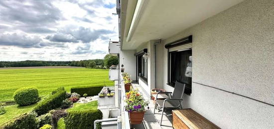 Kaufpreisanpassung - Tolle Eigentumswohnung mit Balkon, TG-Stellplatz und wunderbarem Blick ins Grün