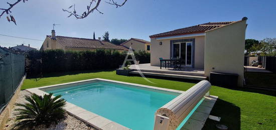 Villa de 2015, 4 chambres, garage jardin et piscine.