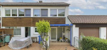 Renovierungsbedürftiges 3-Familien-Reiheneckhaus mit Balkon, Garten und 2 Garagen