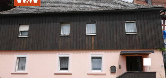 Charmantes Einfamilienhaus mit Renovierungsbedarf in zentraler Lage