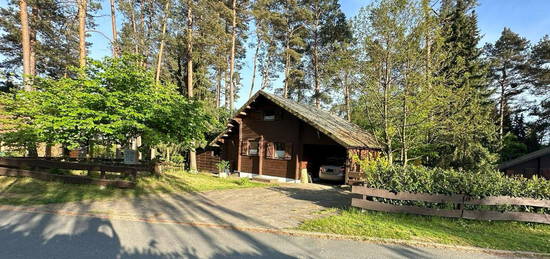 Holzhaus mit eingezäuntem Garten zur Miete