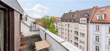 AIGNER - Helle 1-Zimmer-Wohnung mit Dachterrasse im Herzen Haidhausens