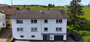 Mehrfamilienhaus in ruhiger Lager mit Garten