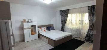 Apartament cu 3 camere, decomandat, parter,65 mp