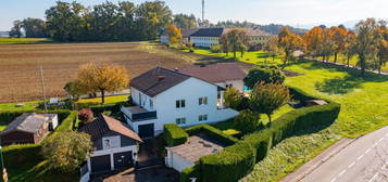 Doppelhaushälfte mit Garten, Terrasse und zwei Garagen in sonniger Lage!