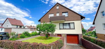 Freistehendes Einfamilienhaus mit Garage und Garten