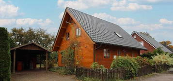 Charmantes Holzhaus mit sonnigem Garten & Carport - zentrale Lage und ideale Familienfreundlichkeit