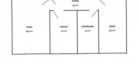 Eladó Karcag központjában 2 szobás tégla építésű társasházi lakás