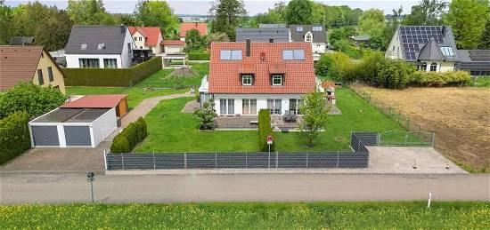 Zwei Doppelhaushälften mit großem Grundstück in idyllischer Wohnlage