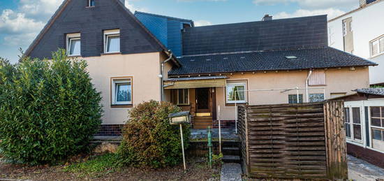 Erweiterungsfähige Doppelhaushälfte auf schönem Grundstück nahe dem Feldrand mit 4-Zimmer, TL-Bad...