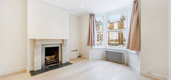 Terraced house to rent in Brackenbury Road, London W6