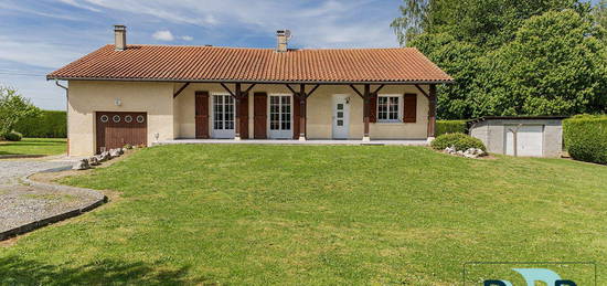 Maison de plain-pied de 100 m² avec 3 chambres.