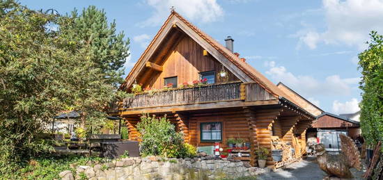 Liebevoll gepflegtes Blockhaus mit ca.155 m² Wohnfläche und Garten mit Naturteich in Schönfließ