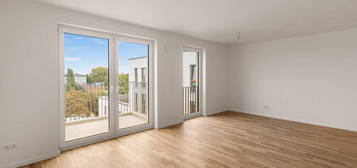 Moderne 3 Zimmer Wohnung Large (unmöbliert) mit Küche und mit Zugang zu Fitnessstudio und Dachterrasse