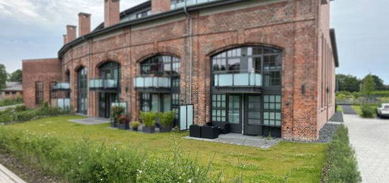 Einzigartig - Terrassenwohnung mit viel Licht und eigenem Gartenanteil - KfW-Effizienzhaus