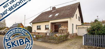 Großzügiges Ein- oder Zweifamilienhaus mit ebenem Garten und Garage in Sierscheid