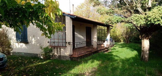 Maison plain pied avec garage et jardin