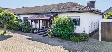 Gemütlicher Bungalow mit idyllischem Garten in zentraler Lage von Rommelhausen