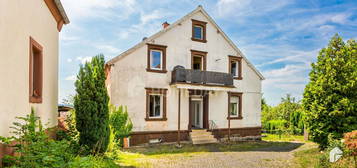 Mehrfamilienhaus mit vier Wohneinheiten, großem Garten und viel Potenzial