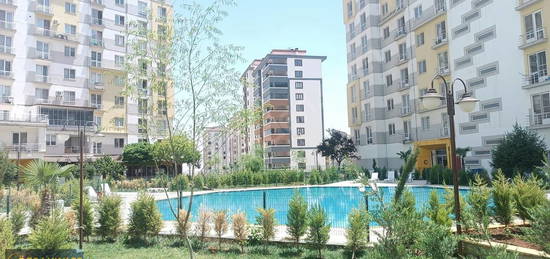 ONKOLOJİDE 1+1 İSKANLI HASARSIZ EŞYALI SATILIK DAİRE