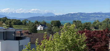 See- und Bergpanorama in Architekten-Doppelhaushälfte