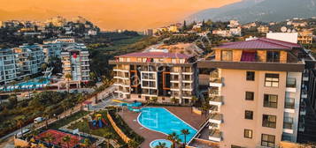 ALANYA KESTEL 1+1 55M2 EYALI FULL AKTVTEL STE ERSNDE DENZE YAKIN DARE!!