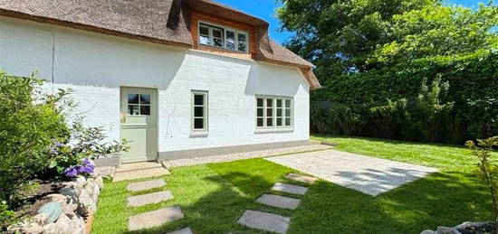 Haus im Haus mit umlaufender Garten und zwei Terrassen - Erstbezug nach Luxus Sanierung(4)